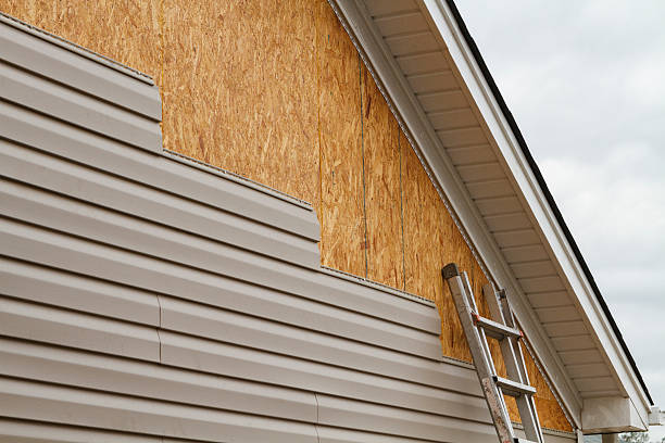 Professional Emergency Siding Repair technician working in Winfield, TN